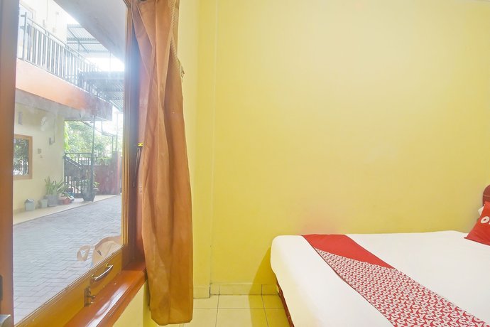 Imagen de la habitación del Hotel OYO 90463 A2b Guesthouse. Foto 5