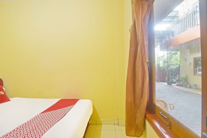 Imagen de la habitación del Hotel OYO 90463 A2b Guesthouse. Foto 10