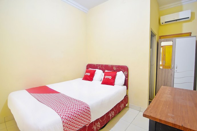 Imagen de la habitación del Hotel OYO 90463 A2b Guesthouse. Foto 11