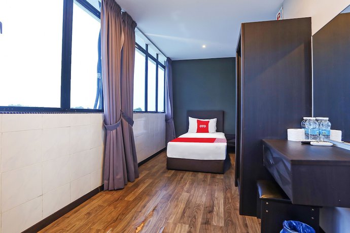 Imagen de la habitación del Hotel OYO 90474 Skycity Motel. Foto 2