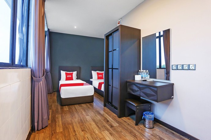 Imagen de la habitación del Hotel OYO 90474 Skycity Motel. Foto 3