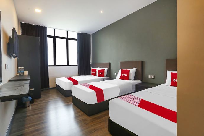 Imagen de la habitación del Hotel OYO 90474 Skycity Motel. Foto 4