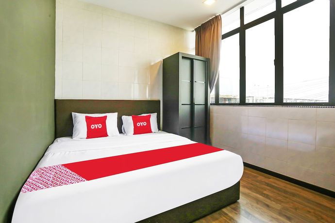 Imagen de la habitación del Hotel OYO 90474 Skycity Motel. Foto 5