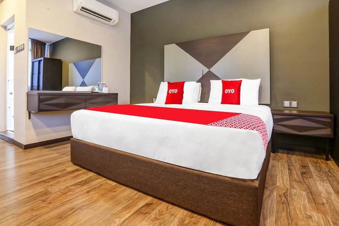Imagen de la habitación del Hotel OYO 90474 Skycity Motel. Foto 12