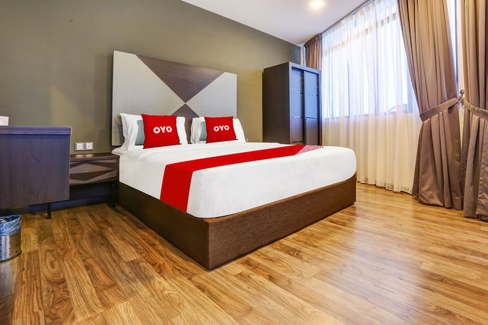 Imagen de la habitación del Hotel OYO 90474 Skycity Motel. Foto 14