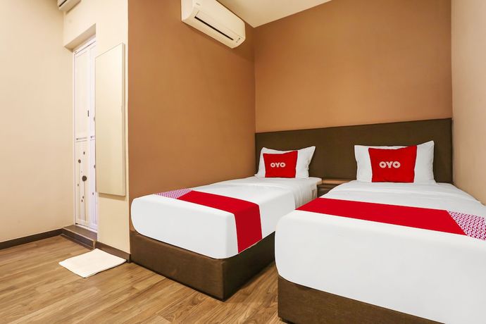 Imagen de la habitación del Hotel OYO 90474 Skycity Motel. Foto 15