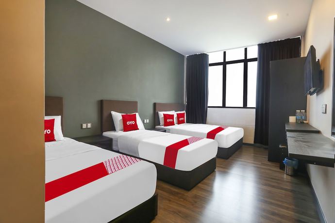 Imagen de la habitación del Hotel OYO 90474 Skycity Motel. Foto 16