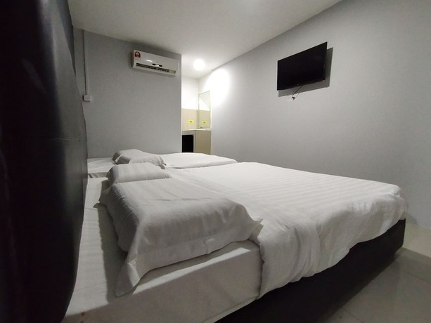 Imagen de la habitación del Hotel OYO 90478 Marina World. Foto 2