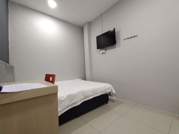 Imagen de la habitación del Hotel OYO 90478 Marina World. Foto 5