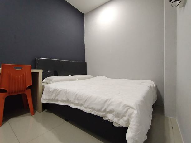 Imagen de la habitación del Hotel OYO 90478 Marina World. Foto 6