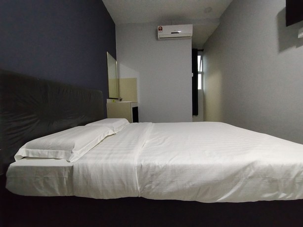 Imagen de la habitación del Hotel OYO 90478 Marina World. Foto 8