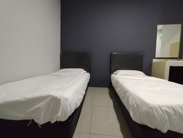 Imagen de la habitación del Hotel OYO 90478 Marina World. Foto 9