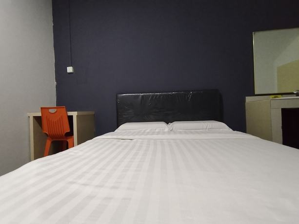 Imagen de la habitación del Hotel OYO 90478 Marina World. Foto 13