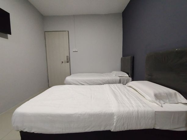 Imagen de la habitación del Hotel OYO 90478 Marina World. Foto 14
