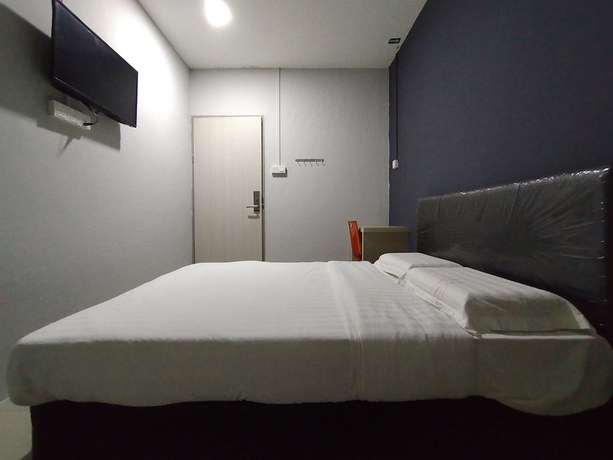 Imagen de la habitación del Hotel OYO 90478 Marina World. Foto 16