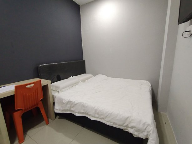 Imagen de la habitación del Hotel OYO 90478 Marina World. Foto 18