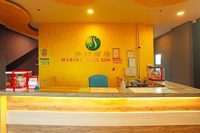Imagen de los interiores del Hotel OYO 90478 Marina World. Foto 20
