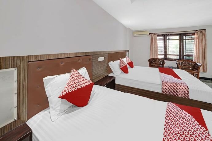Imagen de la habitación del Hotel OYO 90487 Wisma Kuta Karang Baru. Foto 15