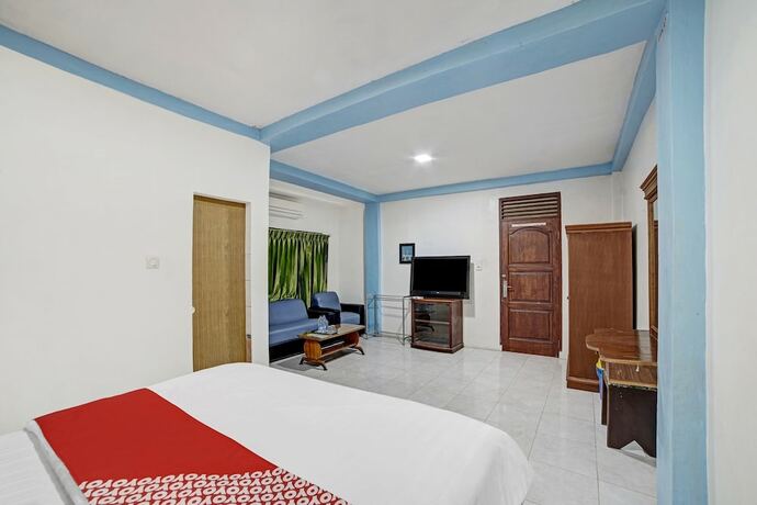 Imagen de la habitación del Hotel OYO 90487 Wisma Kuta Karang Baru. Foto 18