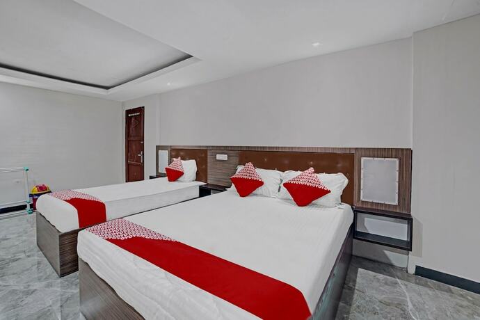 Imagen de la habitación del Hotel OYO 90487 Wisma Kuta Karang Baru. Foto 19