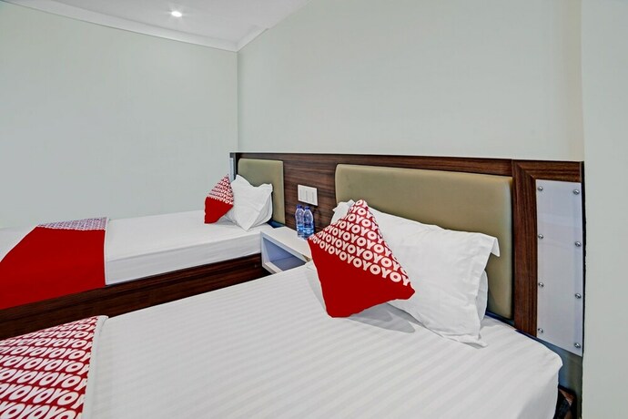 Imagen de la habitación del Hotel OYO 90487 Wisma Kuta Karang Baru. Foto 20