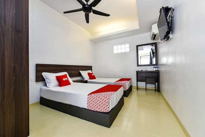 Imagen de la habitación del Hotel OYO 90509 Usima Forest Resort. Foto 8