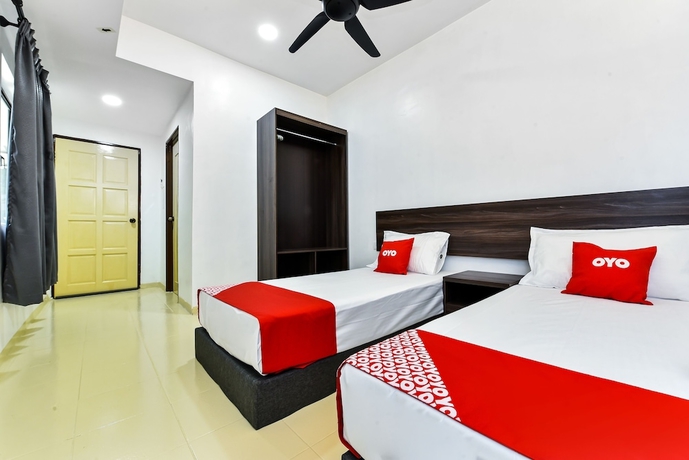 Imagen de la habitación del Hotel OYO 90509 Usima Forest Resort. Foto 11