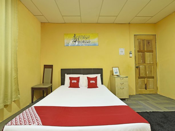 Imagen de la habitación del Hotel OYO 90535 Wakaf Bharu Inn. Foto 5