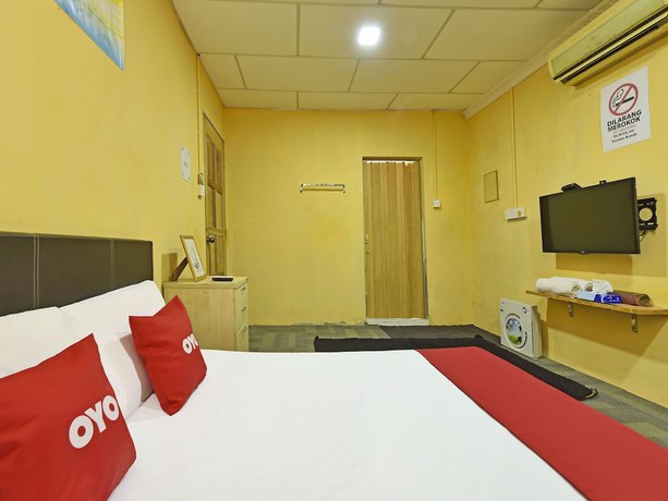 Imagen de la habitación del Hotel OYO 90535 Wakaf Bharu Inn. Foto 6
