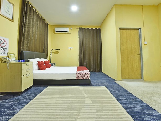 Imagen de la habitación del Hotel OYO 90535 Wakaf Bharu Inn. Foto 7