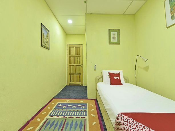 Imagen de la habitación del Hotel OYO 90535 Wakaf Bharu Inn. Foto 9
