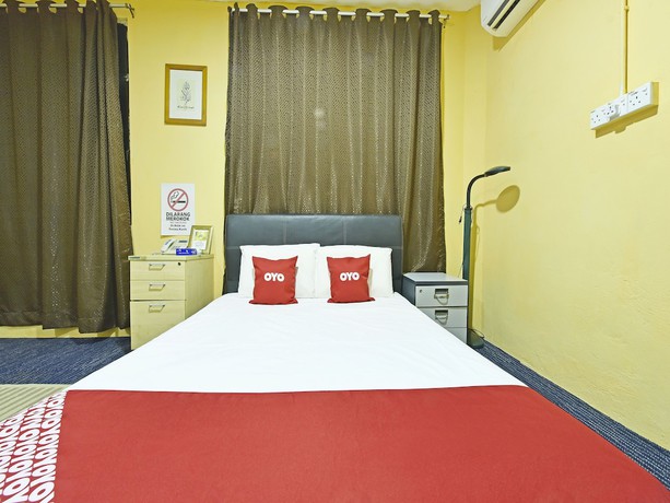 Imagen de la habitación del Hotel OYO 90535 Wakaf Bharu Inn. Foto 11