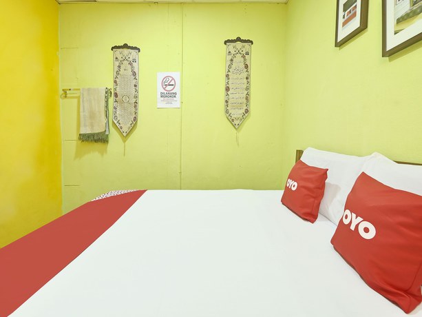 Imagen de la habitación del Hotel OYO 90535 Wakaf Bharu Inn. Foto 12