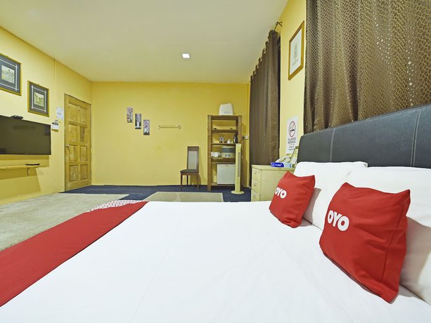 Imagen de la habitación del Hotel OYO 90535 Wakaf Bharu Inn. Foto 13