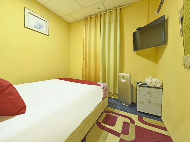 Imagen de la habitación del Hotel OYO 90535 Wakaf Bharu Inn. Foto 15