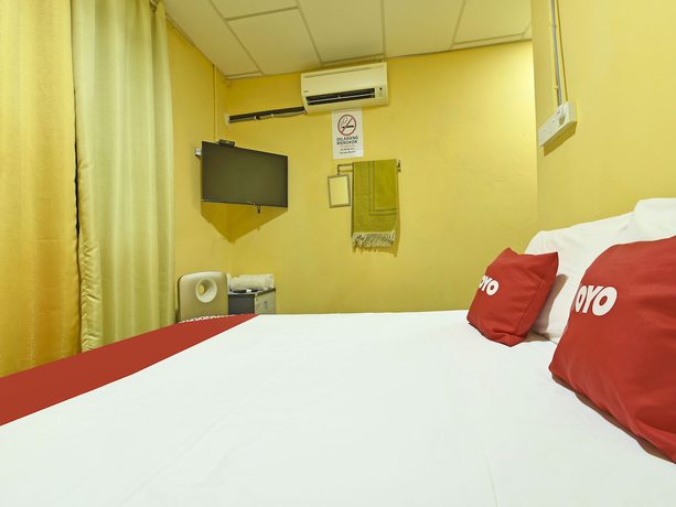 Imagen de la habitación del Hotel OYO 90535 Wakaf Bharu Inn. Foto 16