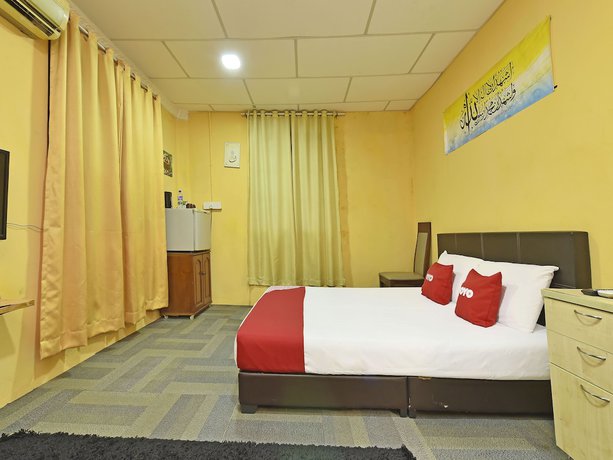 Imagen de la habitación del Hotel OYO 90535 Wakaf Bharu Inn. Foto 18