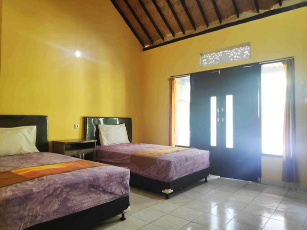 Imagen de la habitación del Hotel OYO 90547 Pondok Saren Anyar. Foto 2
