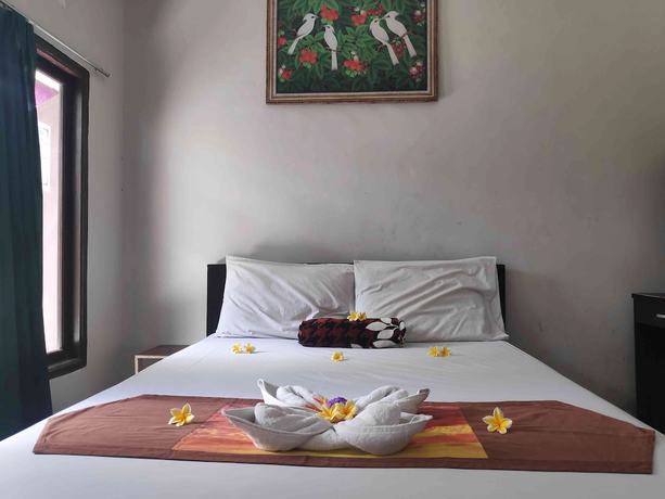Imagen de la habitación del Hotel OYO 90547 Pondok Saren Anyar. Foto 3