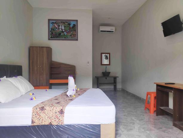 Imagen de la habitación del Hotel OYO 90547 Pondok Saren Anyar. Foto 4