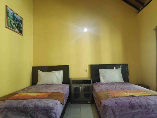 Imagen de la habitación del Hotel OYO 90547 Pondok Saren Anyar. Foto 5