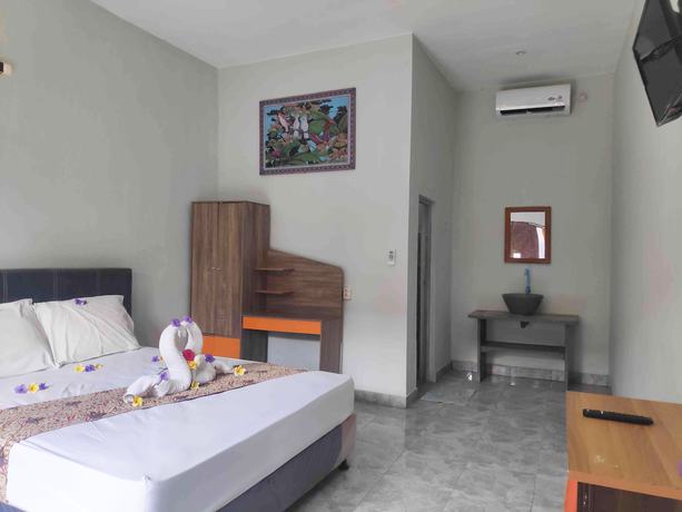 Imagen de la habitación del Hotel OYO 90547 Pondok Saren Anyar. Foto 7