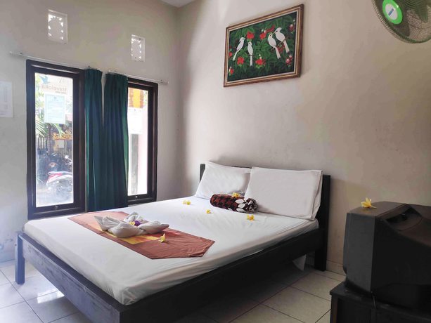 Imagen de la habitación del Hotel OYO 90547 Pondok Saren Anyar. Foto 8