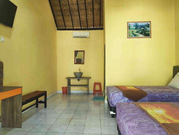 Imagen de la habitación del Hotel OYO 90547 Pondok Saren Anyar. Foto 10