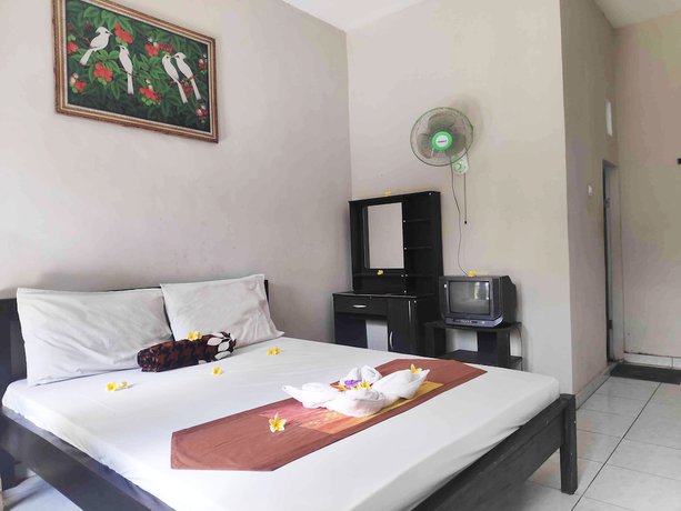 Imagen de la habitación del Hotel OYO 90547 Pondok Saren Anyar. Foto 11