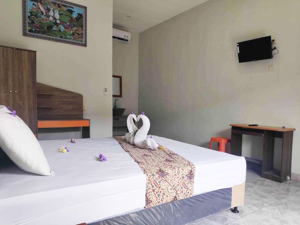 Imagen de la habitación del Hotel OYO 90547 Pondok Saren Anyar. Foto 12