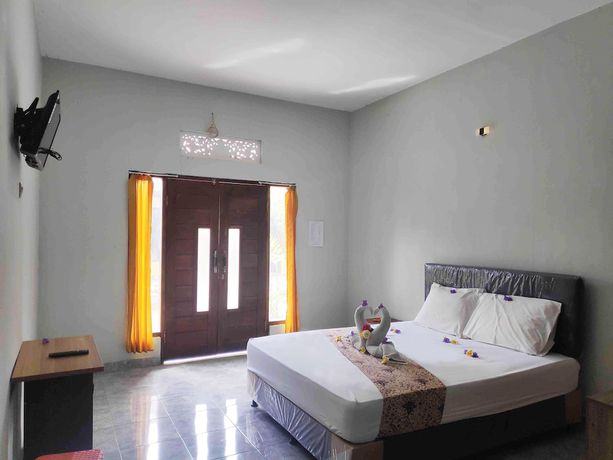 Imagen de la habitación del Hotel OYO 90547 Pondok Saren Anyar. Foto 13