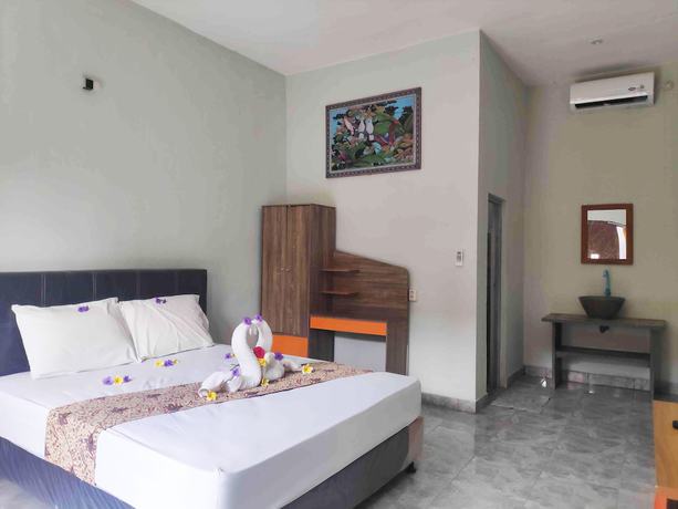 Imagen de la habitación del Hotel OYO 90547 Pondok Saren Anyar. Foto 14