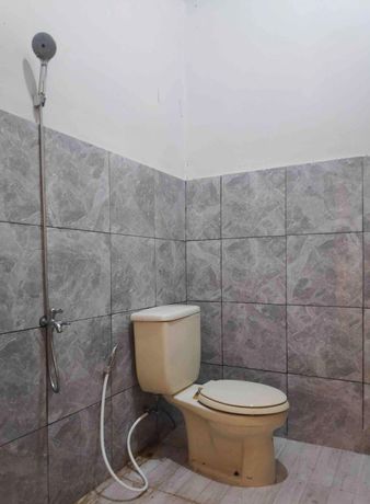 Imagen de la habitación del Hotel OYO 90547 Pondok Saren Anyar. Foto 17