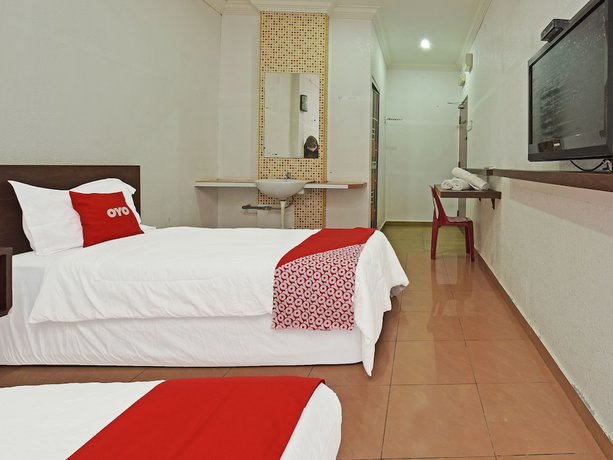 Imagen de la habitación del Hotel OYO 90559 Ummul Motel C Mart. Foto 4